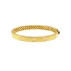 Brazalete de Oro Tornillos Armonía 6mm